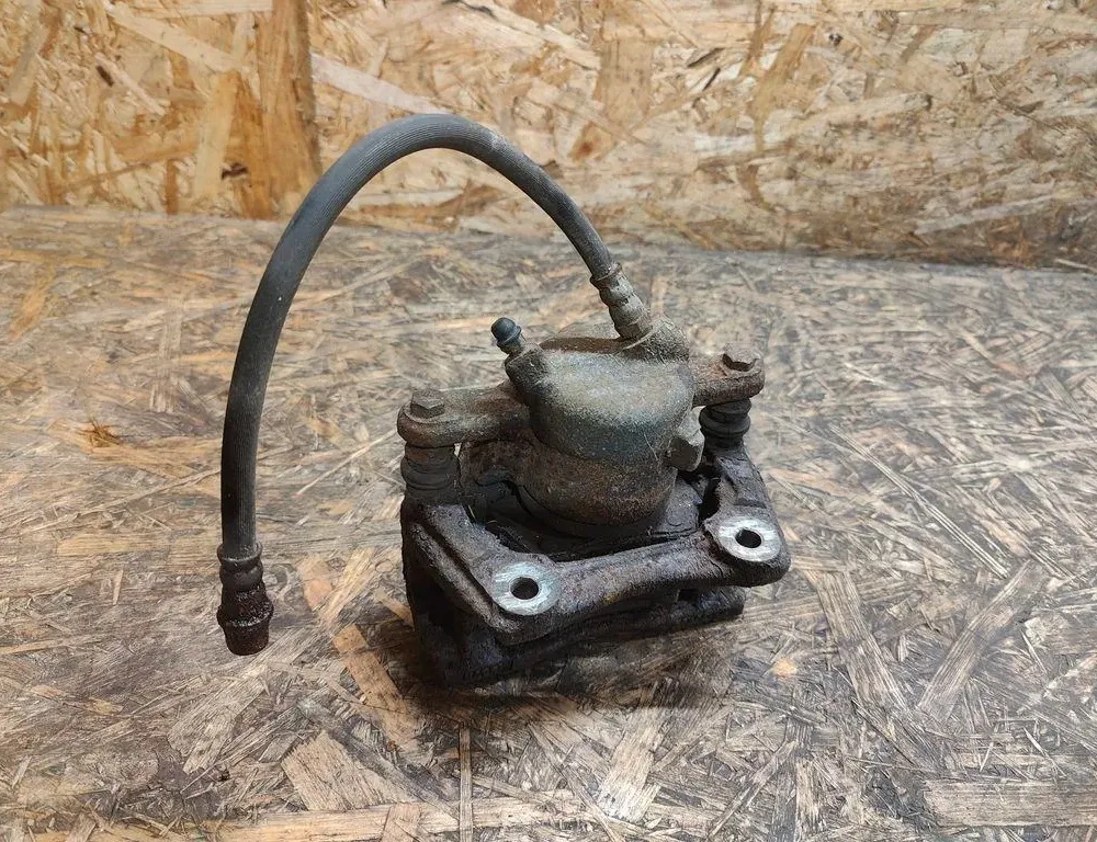 DACIA Logan 2 generation (2013-2020) Zacisk hamulca przedniego prawego 34632032