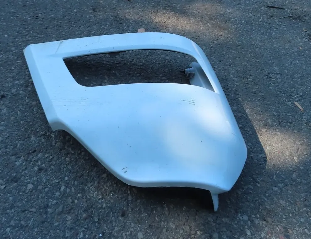 MAN TGX (2007-present) Osłona przedniego lewego reflektora 34801655