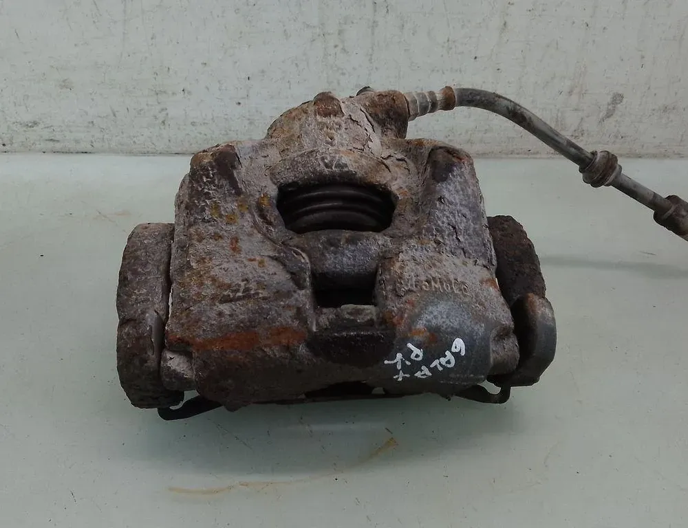 FORD Galaxy 2 generation (2006-2015) Zacisk hamulca przedniego lewego 35091890