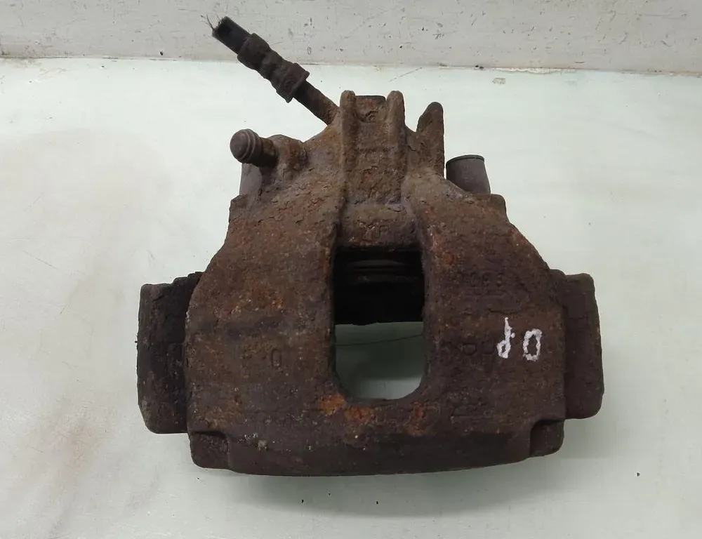 VOLVO S60 1 generation (2000-2009) Zacisk hamulca przedniego prawego 35100012