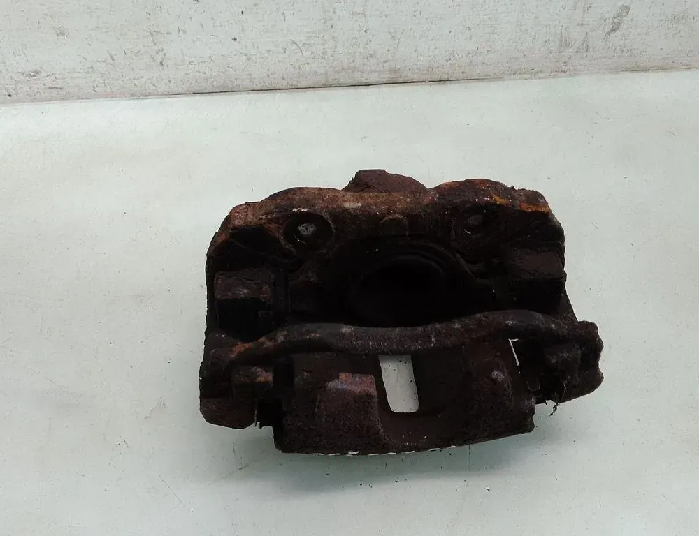 PEUGEOT 207 1 generation (2006-2009) Zacisk hamulca przedniego lewego 35092792