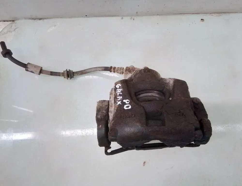 FORD Galaxy 2 generation (2006-2015) Zacisk hamulca przedniego prawego 35083330