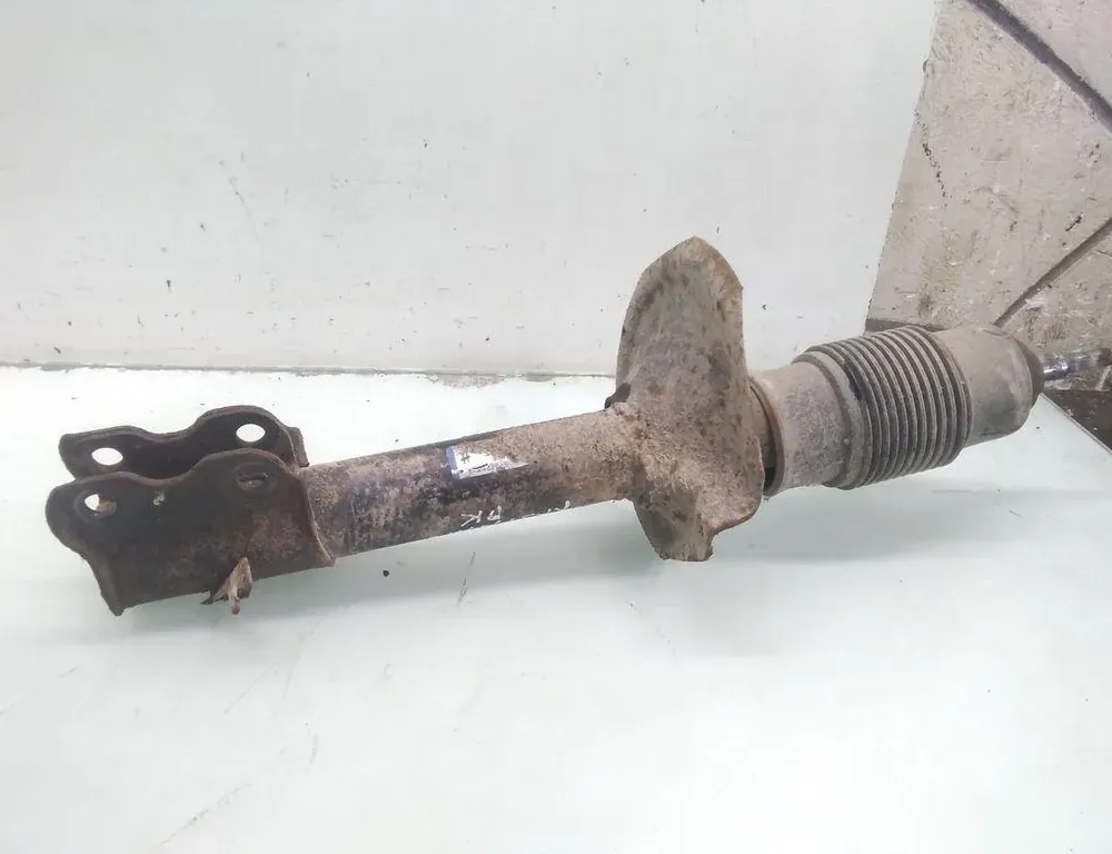 NISSAN X-Trail T30 (2001-2007) Amortyzator przedni lewy 35100483