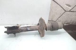 NISSAN X-Trail T30 (2001-2007) Amortyzator przedni lewy 35100483